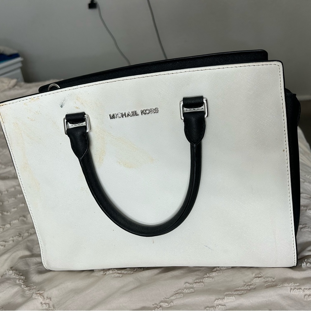 Michael Kors bag, black and white with stain on front